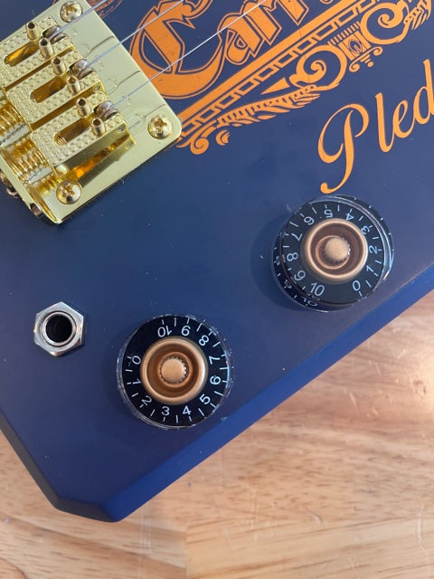 Clear on Black and Gold Plastic Guitar Knob